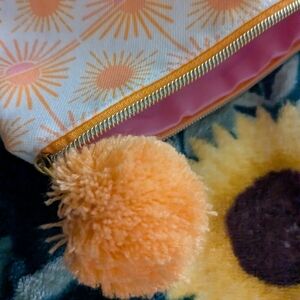 Orange Sunburst Pom Wristlet Clutch - Floral Zip Pouch